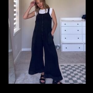 Free people jumpsuit with ruffle ends